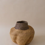 Serenity in Motion minimal black and beige African basket by Kusuka